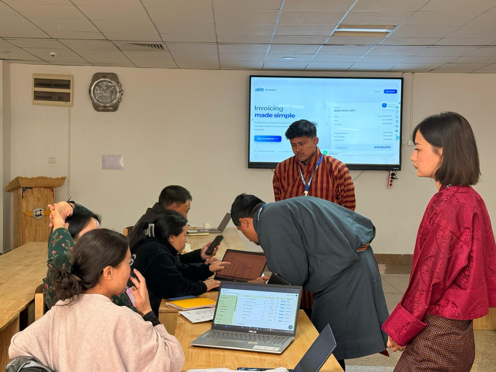 BAS staff in a hands-on aBit Invoice walkthrough at the office.
